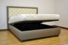 Cama de matrimonio con almacenaje y capitoné en el cabecero