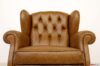 Sillón de cuero bergere con respaldo capitonné