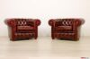 Sillones Chesterfield rojos con ojales