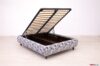 Cama francesa con tela de cuadros azul verdoso