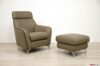 Sillón moderno con puf de piel gris