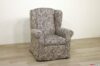 Sillón clásico con respaldo alto y paperas