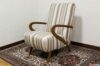 Sillón de los años 50 con reposabrazos de madera