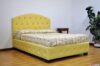 Cama con somier abotonado