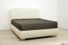 Cama blanca de asuán