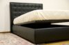 cama con cabecero acolchado