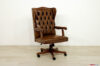 Sillón de oficina de cuero marrón y madera