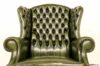 Respaldo y orejas con trabajo capitonné del sillón bergere
